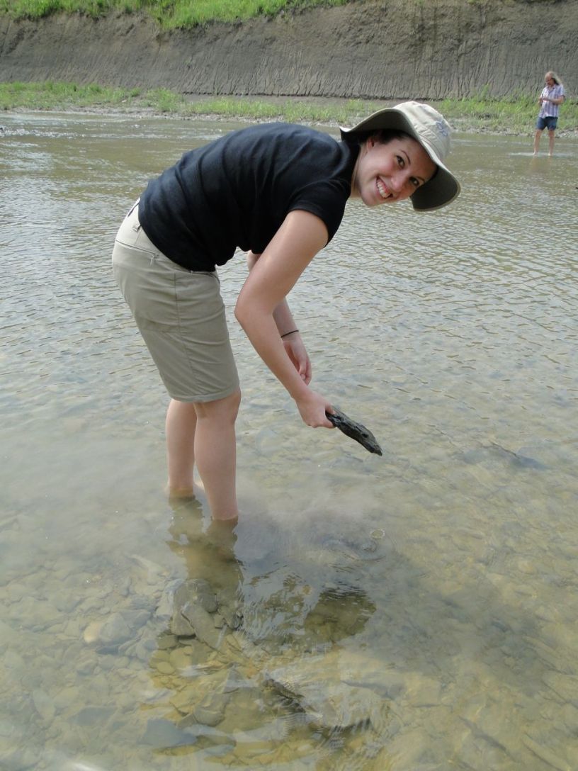 Michelle Campbell Mekarski standing in an ankle deep river holding a rock. Photo provided by Michelle Campbell Mekarski